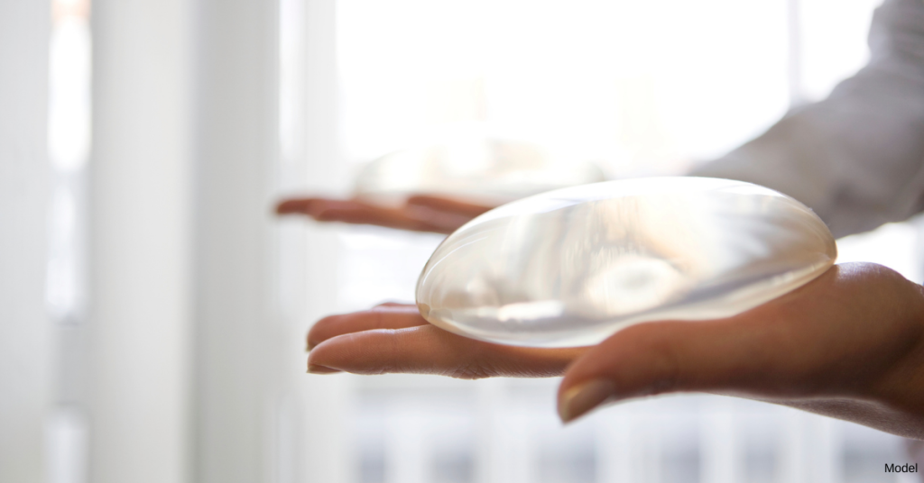 Woman considering best breast implant size in Toronto, ON.