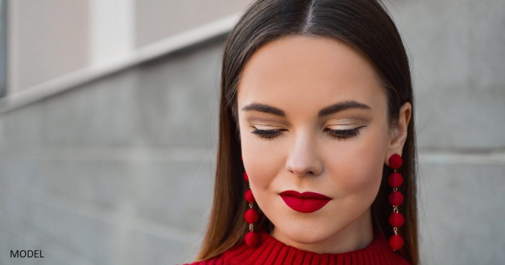 Young woman with full, red lips